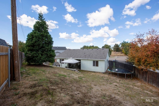 view of yard with a trampoline