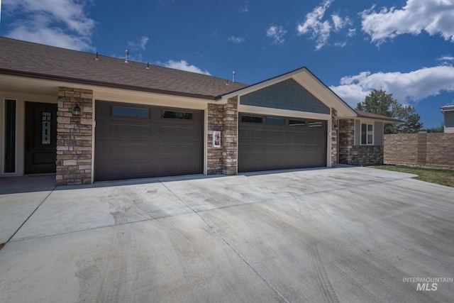 3438 5th St Unit D, Lewiston, ID 83501 - single story home featuring stone siding, concrete driveway, and a garage