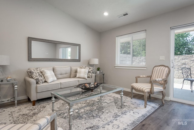 3438 5th St Unit D, Lewiston, ID 83501 - living area featuring wood finished floors, lofted ceiling, healthy amount of natural light, baseboards, and recessed lighting