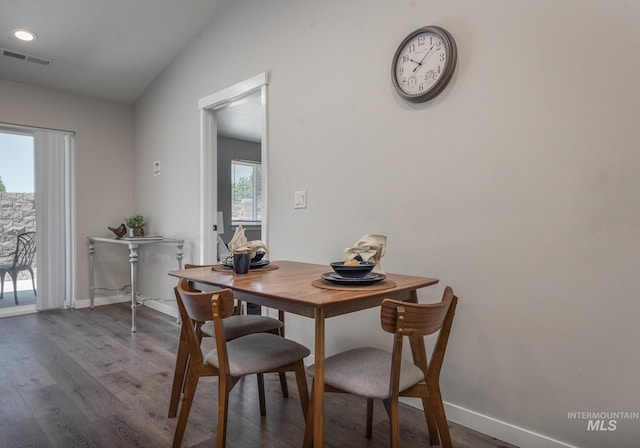 3438 5th St Unit D, Lewiston, ID 83501 - dining room with wood finished floors, baseboards, vaulted ceiling, and recessed lighting