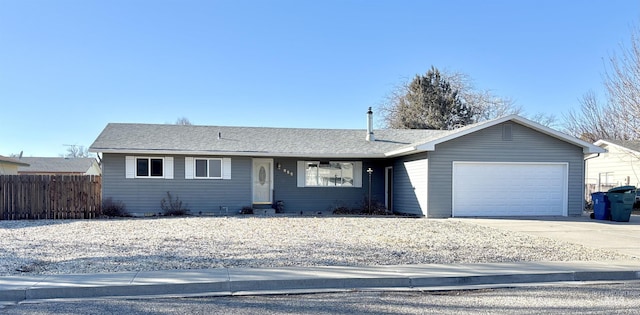 single story home featuring a garage