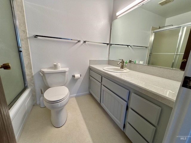 full bathroom featuring toilet, vanity, and combined bath / shower with glass door