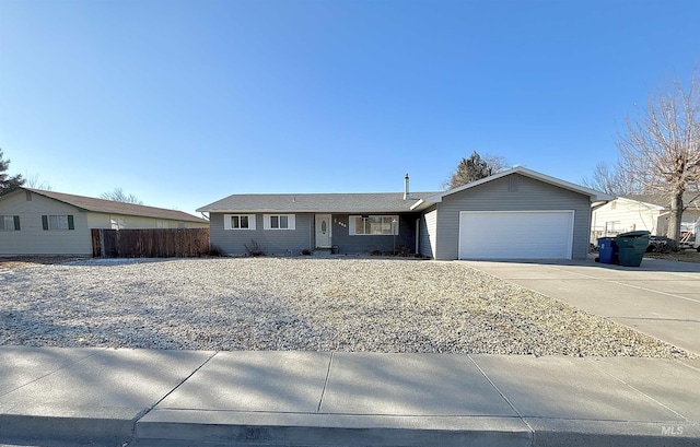 ranch-style house featuring a garage