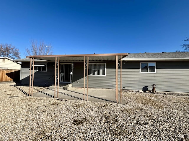 rear view of property featuring a patio