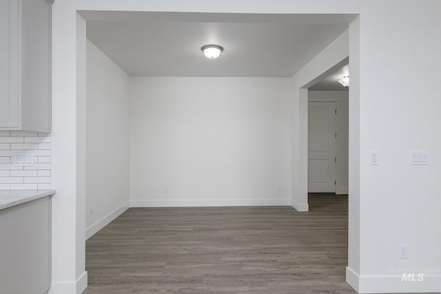 1189 W Grassland St, Middleton, ID 83644 - unfurnished dining area with wood finished floors and baseboards