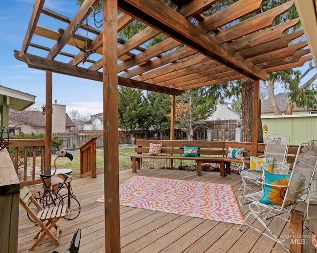 wooden terrace with a pergola and fence