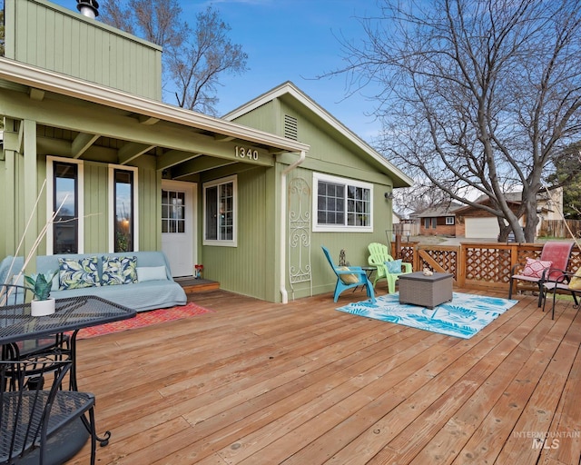 deck with an outdoor living space