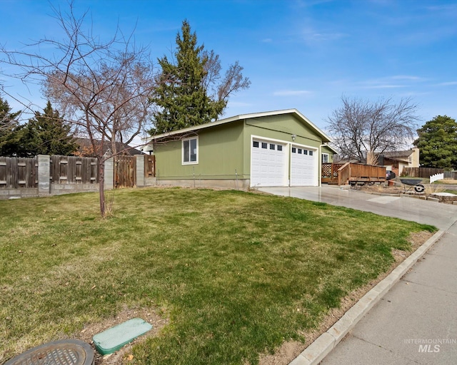 exterior space with fence and driveway