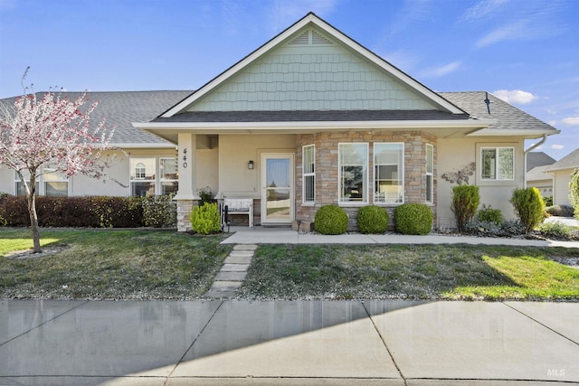 440 S Whisperwood, Boise, ID 83706 - bungalow-style home with a shingled roof, stucco siding, a front lawn, and stone siding