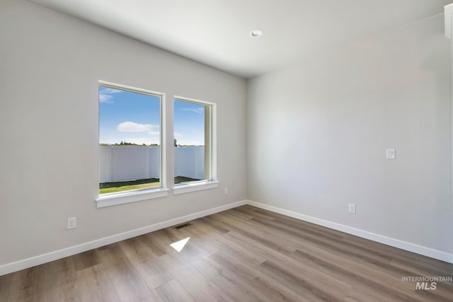 empty room featuring light hardwood / wood-style floors