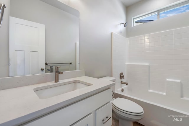 full bathroom featuring vanity, shower / bath combination, and toilet