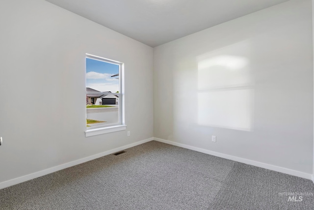 view of carpeted spare room