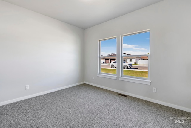 view of carpeted spare room