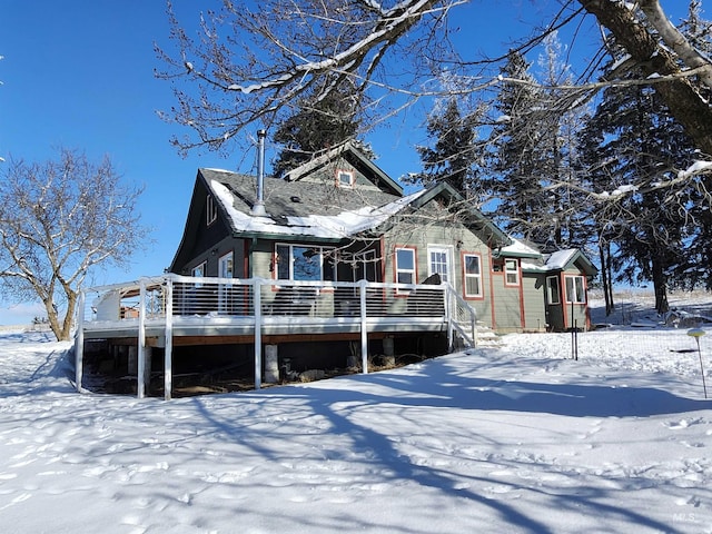 view of front of house with a wooden deck