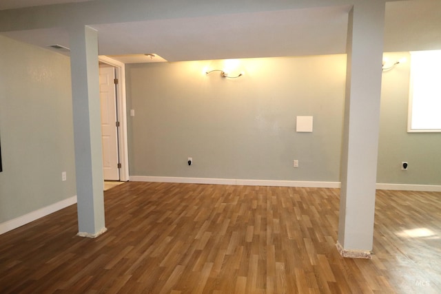 basement with wood finished floors and baseboards