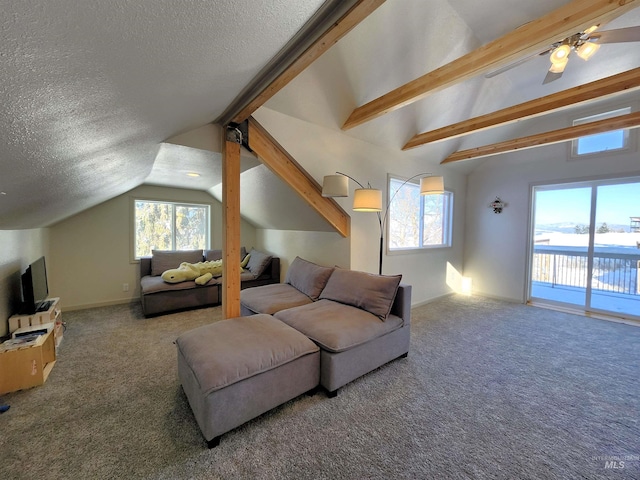 carpeted living area with a ceiling fan, a water view, vaulted ceiling with beams, and a textured ceiling