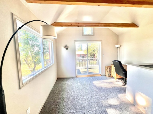 unfurnished office featuring lofted ceiling with beams and carpet flooring