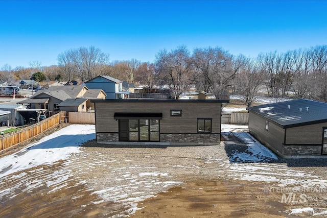 362-436 W London St, Middleton, ID 83644 - exterior space featuring a residential view, stone siding, and fence