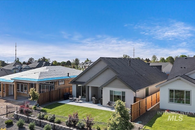 12013 W Zamalek Ct, Kuna, ID 83634 - back of house featuring a patio