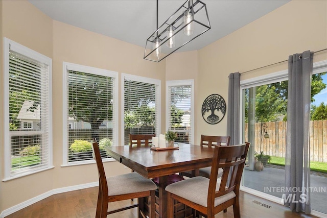 1049 N Purple Sage Way, Eagle, ID 83616 - dining room featuring wood finished floors and baseboards