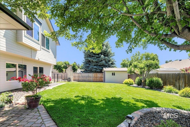 1049 N Purple Sage Way, Eagle, ID 83616 - fenced backyard with a storage unit