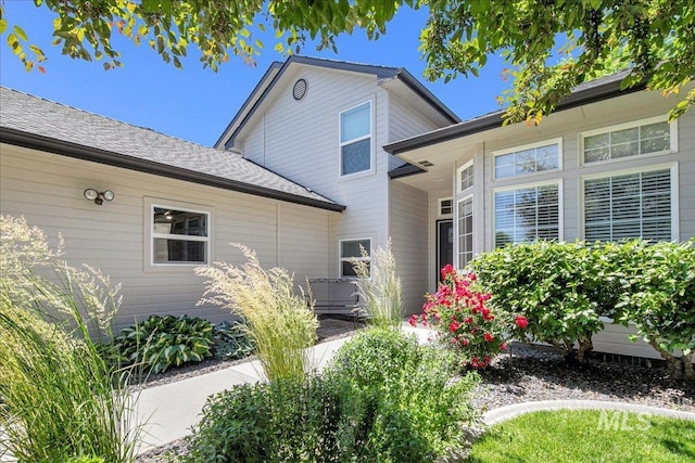 1049 N Purple Sage Way, Eagle, ID 83616 - view of home's exterior featuring a shingled roof