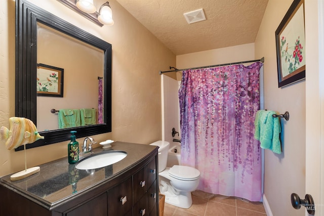 4965 S Nickel Creek Ave, Meridian, ID 83642 - full bathroom featuring a textured ceiling, toilet, visible vents, tile patterned flooring, and shower / bathtub combination with curtain