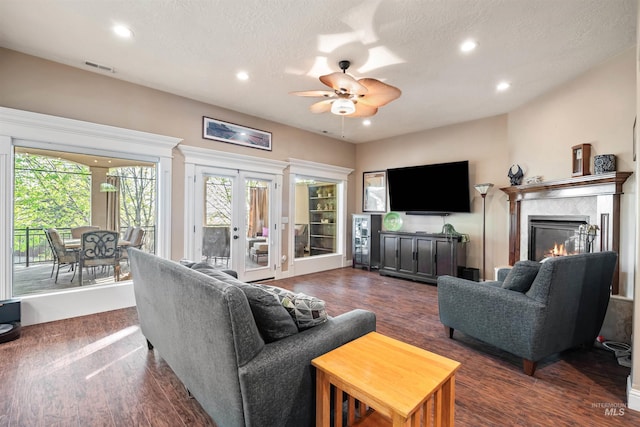 4965 S Nickel Creek Ave, Meridian, ID 83642 - living area with a wealth of natural light, ceiling fan, recessed lighting, and dark wood-type flooring