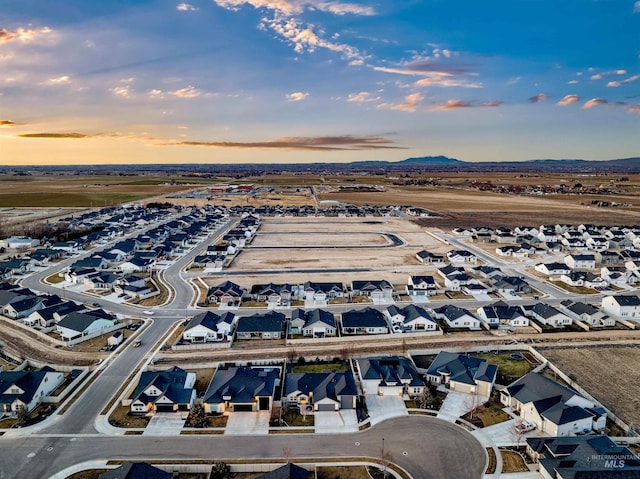 aerial view with a mountain view and a residential view