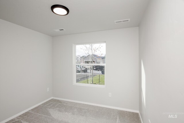 11069 Canvas St, Caldwell, ID 83605 - carpeted spare room with baseboards and visible vents