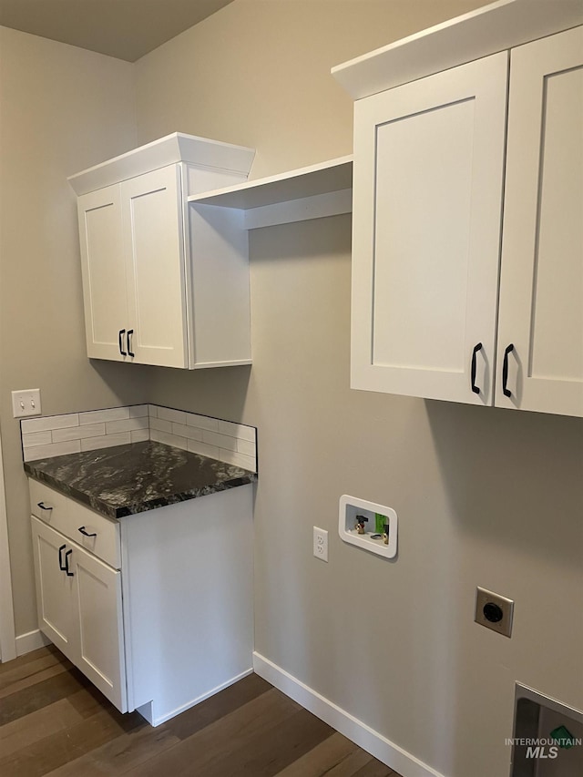 467 Hope Ave, Twin Falls, ID 83301 - laundry area featuring hookup for an electric dryer, cabinet space, dark wood-style flooring, and baseboards