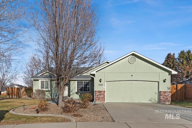 ranch-style house featuring a garage