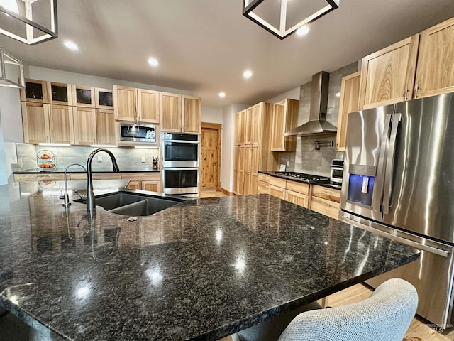 1321 Lande Ln, Moscow, ID 83843 - kitchen with light brown cabinetry, a sink, tasteful backsplash, stainless steel appliances, and wall chimney exhaust hood