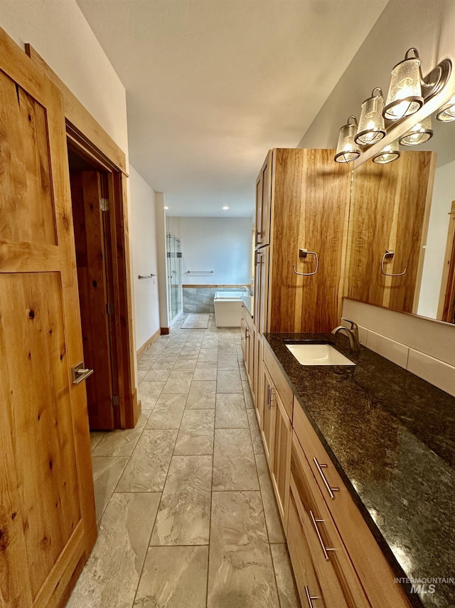 1321 Lande Ln, Moscow, ID 83843 - bathroom with vanity and baseboards