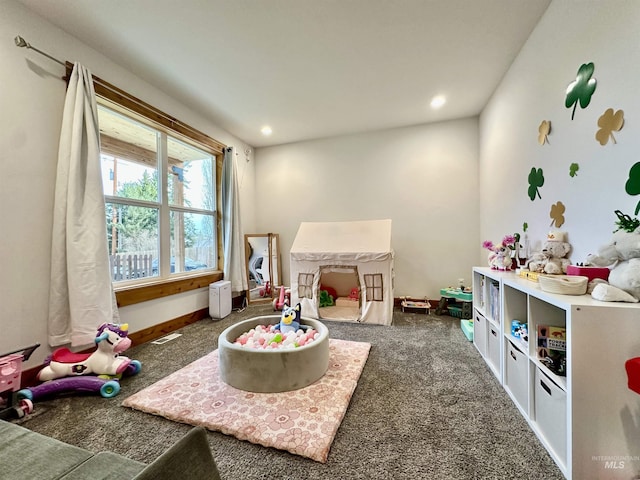 1321 Lande Ln, Moscow, ID 83843 - recreation room with recessed lighting, baseboards, carpet floors, and visible vents