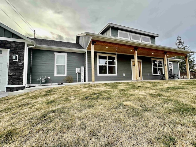 1321 Lande Ln, Moscow, ID 83843 - view of front of home with a front lawn and stone siding