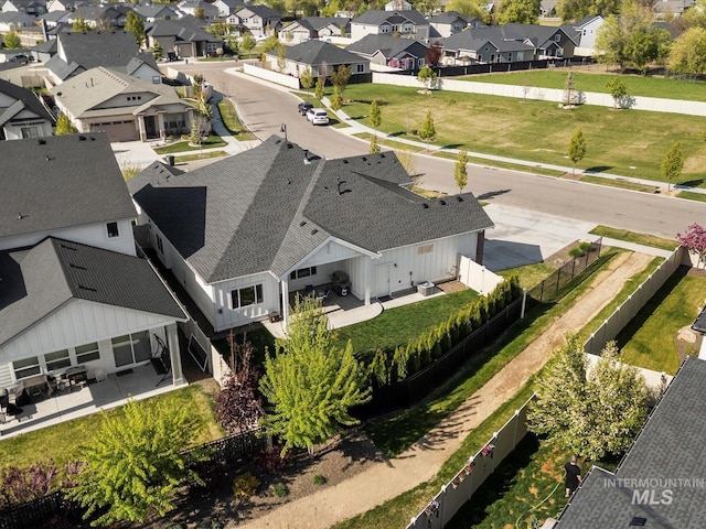 drone / aerial view with a residential view