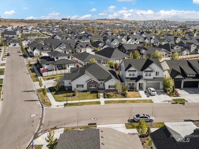 drone / aerial view with a residential view