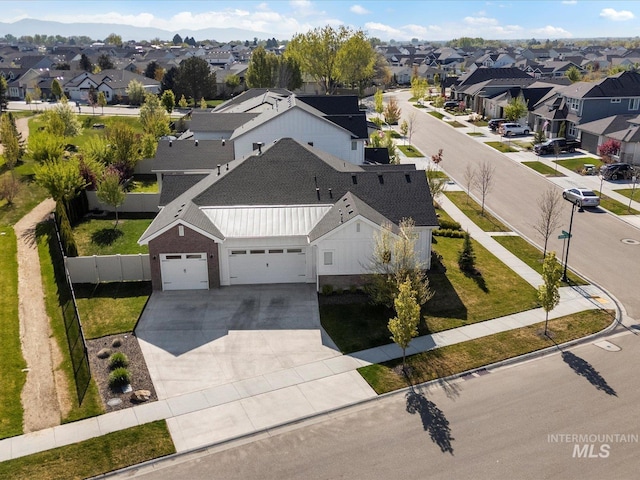 drone / aerial view with a residential view
