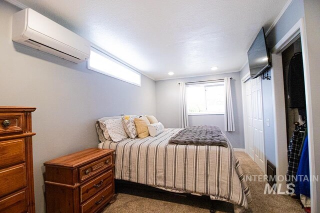 1627 Verdant Ct, Emmett, ID 83617 - carpeted bedroom with a wall mounted AC and recessed lighting