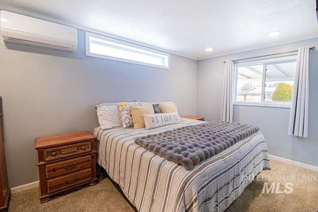 1627 Verdant Ct, Emmett, ID 83617 - bedroom with a wall unit AC, light colored carpet, and baseboards