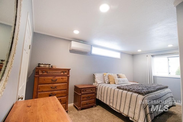 1627 Verdant Ct, Emmett, ID 83617 - bedroom with a wall mounted air conditioner, light colored carpet, recessed lighting, crown molding, and baseboards