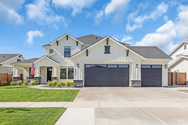 9478 W Napier St, Star, ID 83669 - modern farmhouse style home featuring an attached garage, board and batten siding, driveway, and a shingled roof