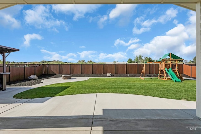 9478 W Napier St, Star, ID 83669 - view of yard featuring a fire pit, a patio area, and a playground