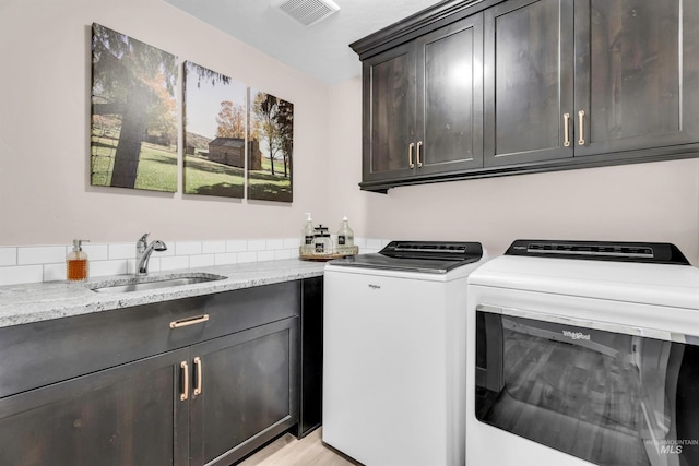 9478 W Napier St, Star, ID 83669 - laundry area with washing machine and clothes dryer and cabinet space