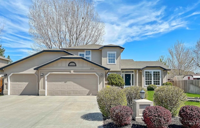 2506 S Culpeper Ave, Boise, ID 83709 - traditional-style house featuring an attached garage, fence, and concrete driveway