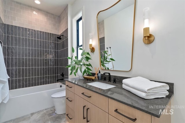 bathroom with recessed lighting, bathing tub / shower combination, toilet, and vanity