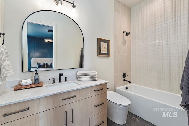 full bath featuring toilet,  shower combination, and vanity