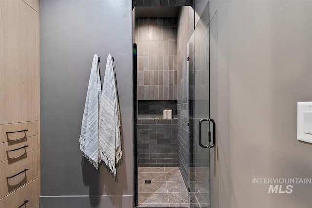 bathroom with a stall shower