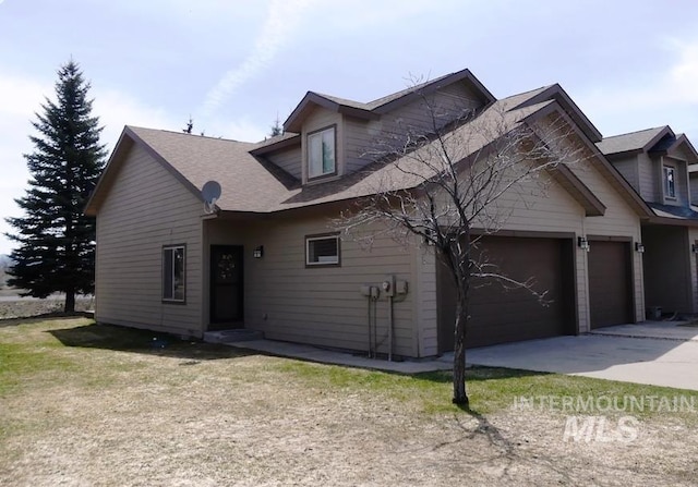 24 Mangum Dr Unit 1, Donnelly, ID 83615 - view of front of home featuring concrete driveway